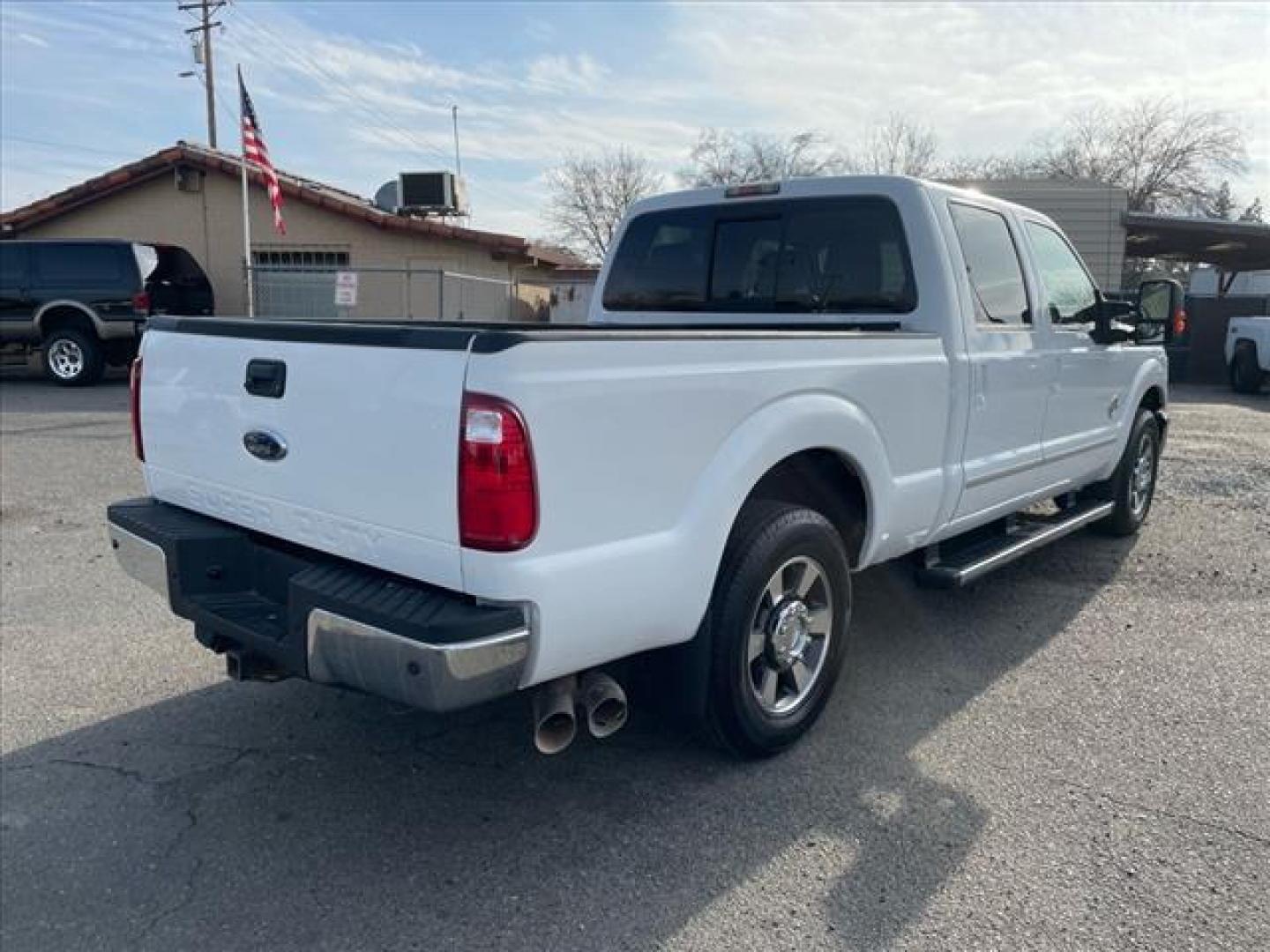 2011 Oxford White Ford F-250 Super Duty Lariat (1FT7W2AT2BE) with an 6.7L Power Stroke 6.7L Biodiesel Turbo V8 400hp 800ft. lbs. Common Rail Direct Injection engine, 6-Speed Shiftable Automatic transmission, located at 800 Riverside Ave, Roseville, CA, 95678, (916) 773-4549, 38.732265, -121.291039 - DIESEL CREW CAB LARIAT LOW MILES - Photo#3