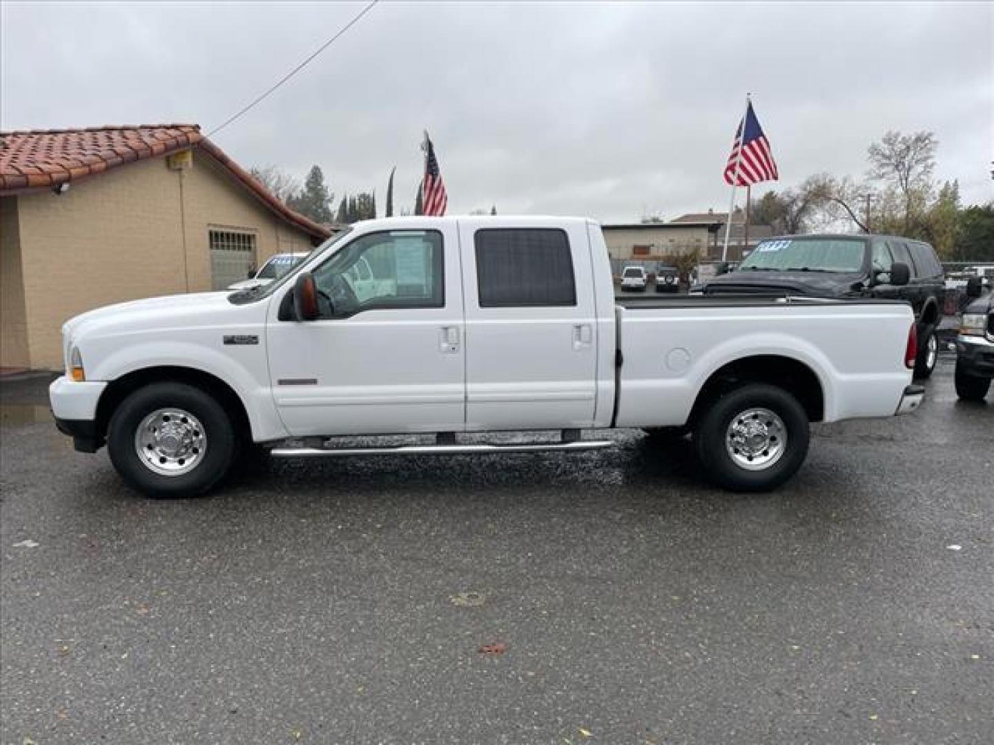 2003 Oxford White Ford F-250 Super Duty XLT (1FTNW20P43E) with an 6.0L Power Stroke 6.0L Diesel Turbo V8 325hp 560ft. lbs. Other engine, 5-Speed Automatic transmission, located at 800 Riverside Ave, Roseville, CA, 95678, (916) 773-4549, 38.732265, -121.291039 - Photo#4