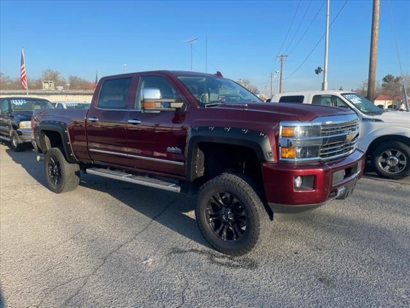 2016 Butte Red Metallic Chevrolet Silverado 2500HD High Country (1GC1KXE87GF) with an 6.6L Duramax 6.6L Diesel Turbo V8 397hp 765ft. lbs. Common Rail Direct Injection engine, Allison 1000 6-Speed Shiftable Automatic transmission, located at 800 Riverside Ave, Roseville, CA, 95678, (916) 773-4549, 38.732265, -121.291039 - Photo#1