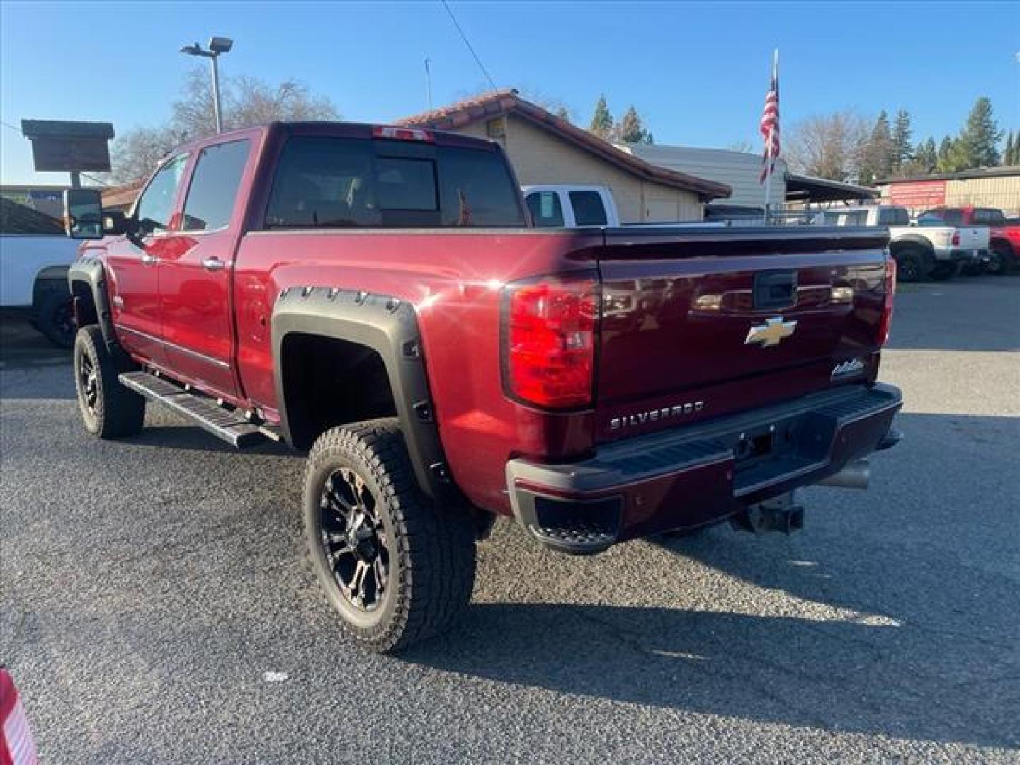 2016 Butte Red Metallic Chevrolet Silverado 2500HD High Country (1GC1KXE87GF) with an 6.6L Duramax 6.6L Diesel Turbo V8 397hp 765ft. lbs. Common Rail Direct Injection engine, Allison 1000 6-Speed Shiftable Automatic transmission, located at 800 Riverside Ave, Roseville, CA, 95678, (916) 773-4549, 38.732265, -121.291039 - Photo#4