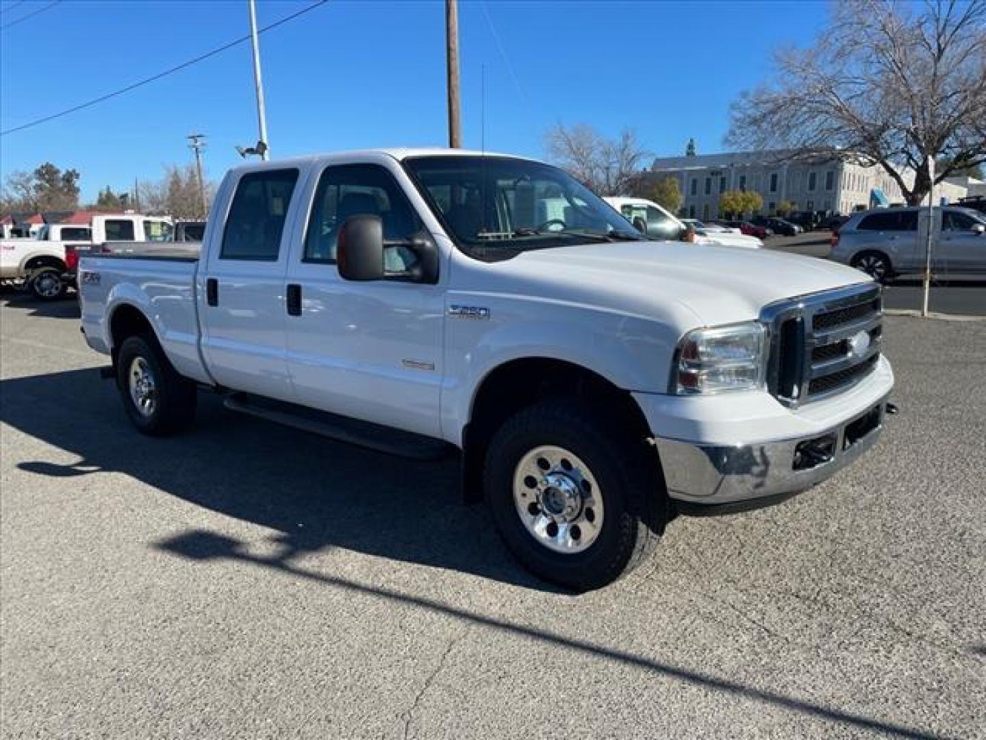 2006 Oxford White Clearcoat Ford F-250 Super Duty XLT (1FTSW21P96E) with an 6.0L Power Stroke 6.0L Diesel Turbo V8 325hp 560ft. lbs. Direct Injection engine, 5-Speed Automatic transmission, located at 800 Riverside Ave, Roseville, CA, 95678, (916) 773-4549, 38.732265, -121.291039 - DIESEL CREW CAB 4X4 FX4 XLT HEADSTUDS BULLET PROOF EGR COOLER CLEAN CARFAX - Photo#1