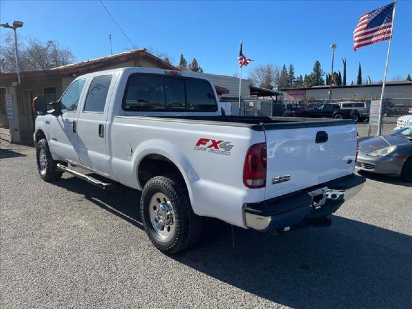 2006 Oxford White Clearcoat Ford F-250 Super Duty XLT (1FTSW21P96E) with an 6.0L Power Stroke 6.0L Diesel Turbo V8 325hp 560ft. lbs. Direct Injection engine, 5-Speed Automatic transmission, located at 800 Riverside Ave, Roseville, CA, 95678, (916) 773-4549, 38.732265, -121.291039 - DIESEL CREW CAB 4X4 FX4 XLT HEADSTUDS BULLET PROOF EGR COOLER CLEAN CARFAX - Photo#2