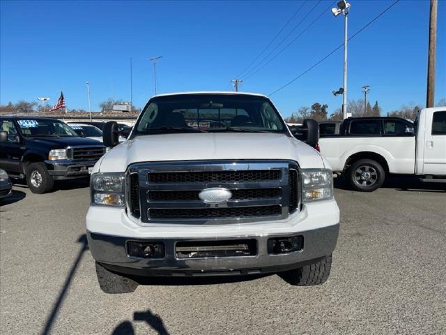 2006 Oxford White Clearcoat Ford F-250 Super Duty XLT (1FTSW21P96E) with an 6.0L Power Stroke 6.0L Diesel Turbo V8 325hp 560ft. lbs. Direct Injection engine, 5-Speed Automatic transmission, located at 800 Riverside Ave, Roseville, CA, 95678, (916) 773-4549, 38.732265, -121.291039 - DIESEL CREW CAB 4X4 FX4 XLT HEADSTUDS BULLET PROOF EGR COOLER CLEAN CARFAX - Photo#7