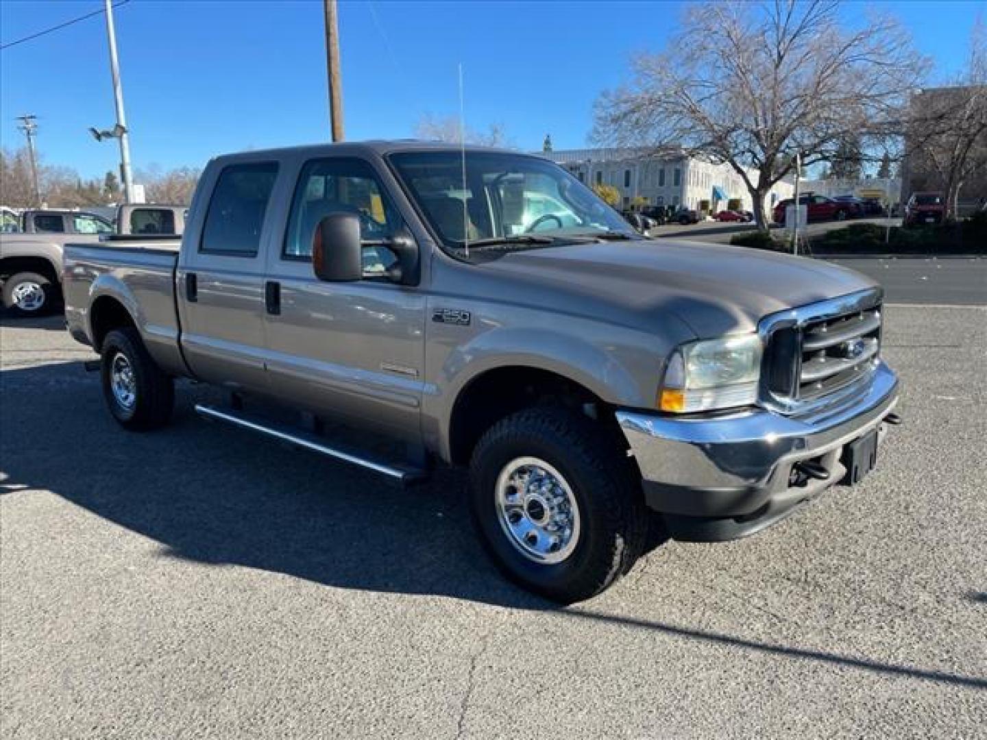 2004 Arizona Beige Clearcoat Metallic Ford F-250 Super Duty XLT (1FTNW21P04E) with an Power Stroke 6.0L Diesel Turbo V8 325hp 560ft. lbs. Other engine, 5-Speed Automatic transmission, located at 800 Riverside Ave, Roseville, CA, 95678, (916) 773-4549, 38.732265, -121.291039 - DIESEL CREW CAB 4X4 XLT LOW MILES SERVICE RECORDS - Photo#1