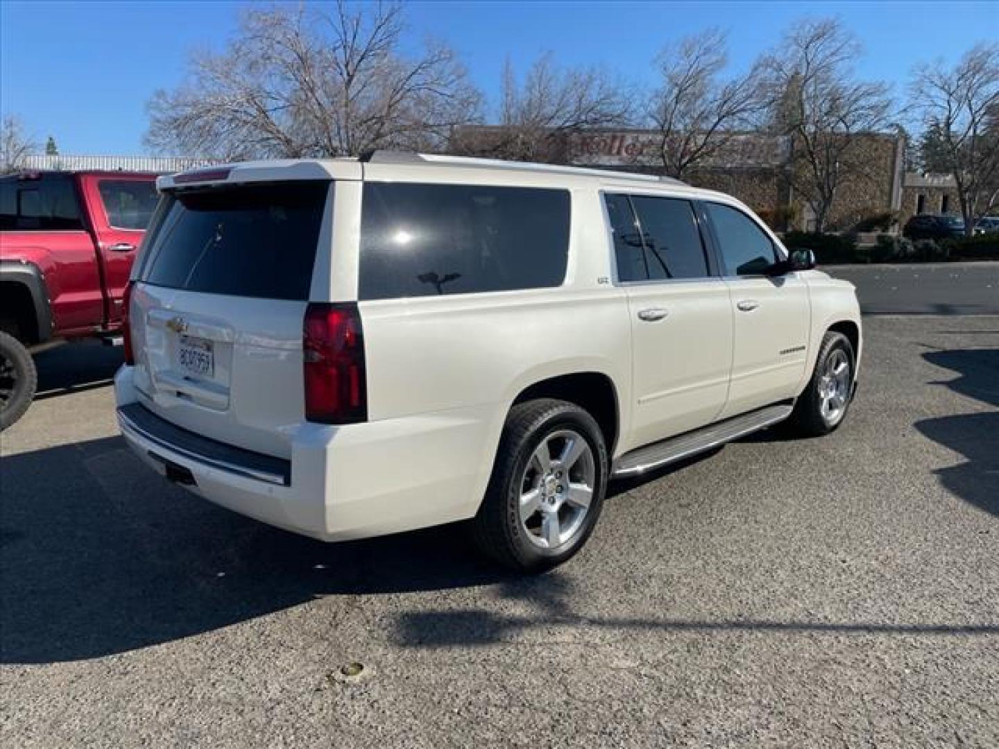 2015 White Diamond Tricoat Chevrolet Suburban LTZ (1GNSKKKC0FR) with an 5.3L EcoTec3 5.3L Flex Fuel V8 355hp 383ft. lbs. Direct Injection engine, 6-Speed Shiftable Automatic w/Overdrive transmission, located at 800 Riverside Ave, Roseville, CA, 95678, (916) 773-4549, 38.732265, -121.291039 - 4X4 LTZ DVD CLEAN CARFAX - Photo#3