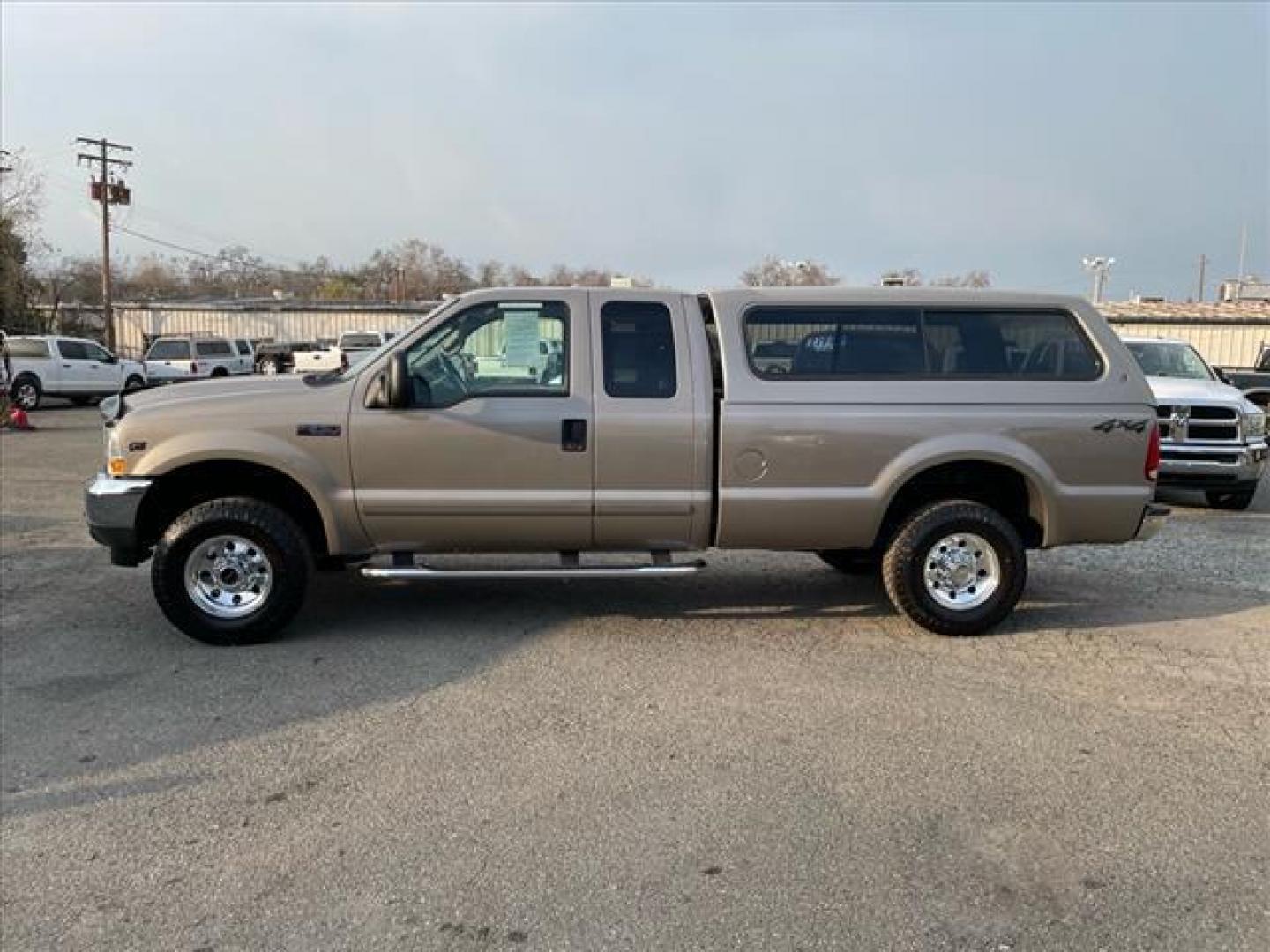 2002 Arizona Beige Clearcoat Metallic Ford F-250 Super Duty XLT (1FTNX21S82E) with an Triton 6.8L V10 310hp 425ft. lbs. Other engine, 4-Speed Automatic transmission, located at 800 Riverside Ave, Roseville, CA, 95678, (916) 773-4549, 38.732265, -121.291039 - Photo#4