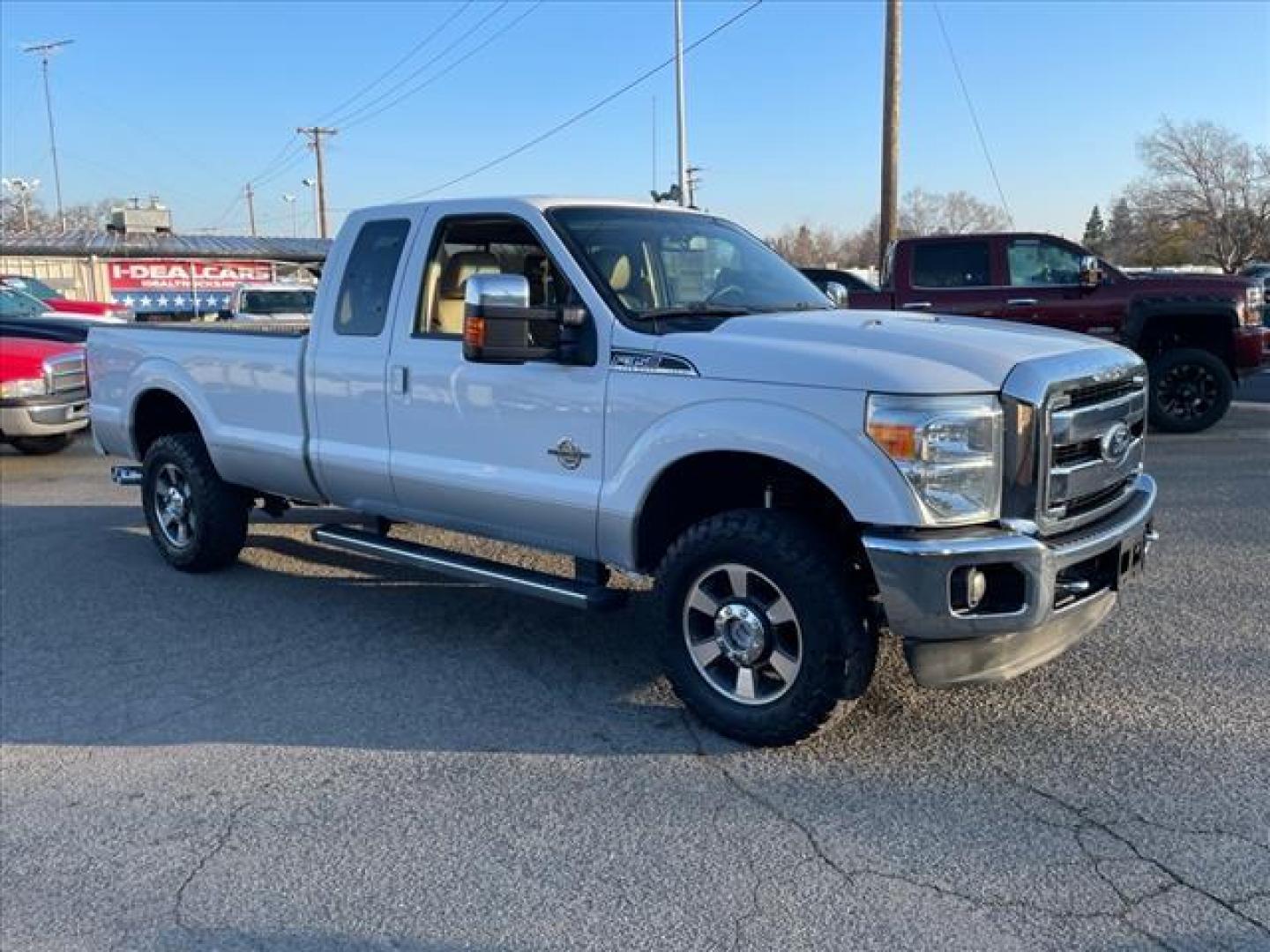 2011 Oxford White/Sterling Grey Ford F-350 Super Duty Lariat (1FT8X3BT9BE) with an 6.7L Power Stroke 6.7L Biodiesel Turbo V8 400hp 800ft. lbs. Common Rail Direct Injection engine, 6-Speed Shiftable Automatic transmission, located at 800 Riverside Ave, Roseville, CA, 95678, (916) 773-4549, 38.732265, -121.291039 - DIESEL SUPER CAB 4X4 LARIAT ONE OWNER SERVICE RECORDS ON CLEAN CARFAX - Photo#1