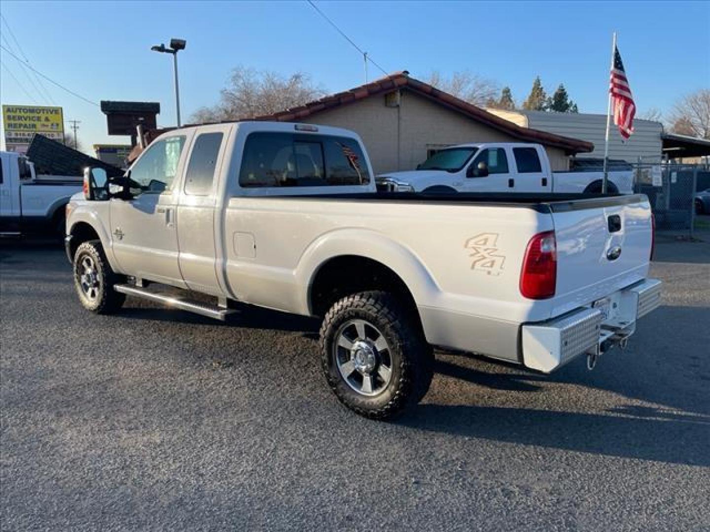 2011 Oxford White/Sterling Grey Ford F-350 Super Duty Lariat (1FT8X3BT9BE) with an 6.7L Power Stroke 6.7L Biodiesel Turbo V8 400hp 800ft. lbs. Common Rail Direct Injection engine, 6-Speed Shiftable Automatic transmission, located at 800 Riverside Ave, Roseville, CA, 95678, (916) 773-4549, 38.732265, -121.291039 - DIESEL SUPER CAB 4X4 LARIAT ONE OWNER SERVICE RECORDS ON CLEAN CARFAX - Photo#2