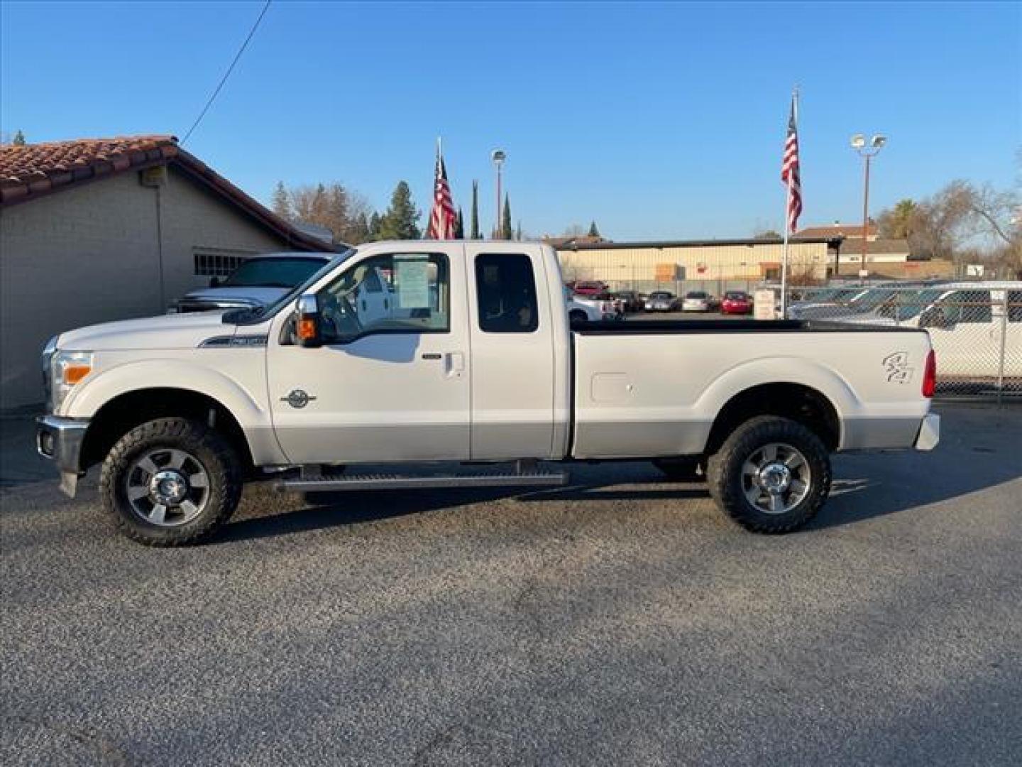 2011 Oxford White/Sterling Grey Ford F-350 Super Duty Lariat (1FT8X3BT9BE) with an 6.7L Power Stroke 6.7L Biodiesel Turbo V8 400hp 800ft. lbs. Common Rail Direct Injection engine, 6-Speed Shiftable Automatic transmission, located at 800 Riverside Ave, Roseville, CA, 95678, (916) 773-4549, 38.732265, -121.291039 - DIESEL SUPER CAB 4X4 LARIAT ONE OWNER SERVICE RECORDS ON CLEAN CARFAX - Photo#4