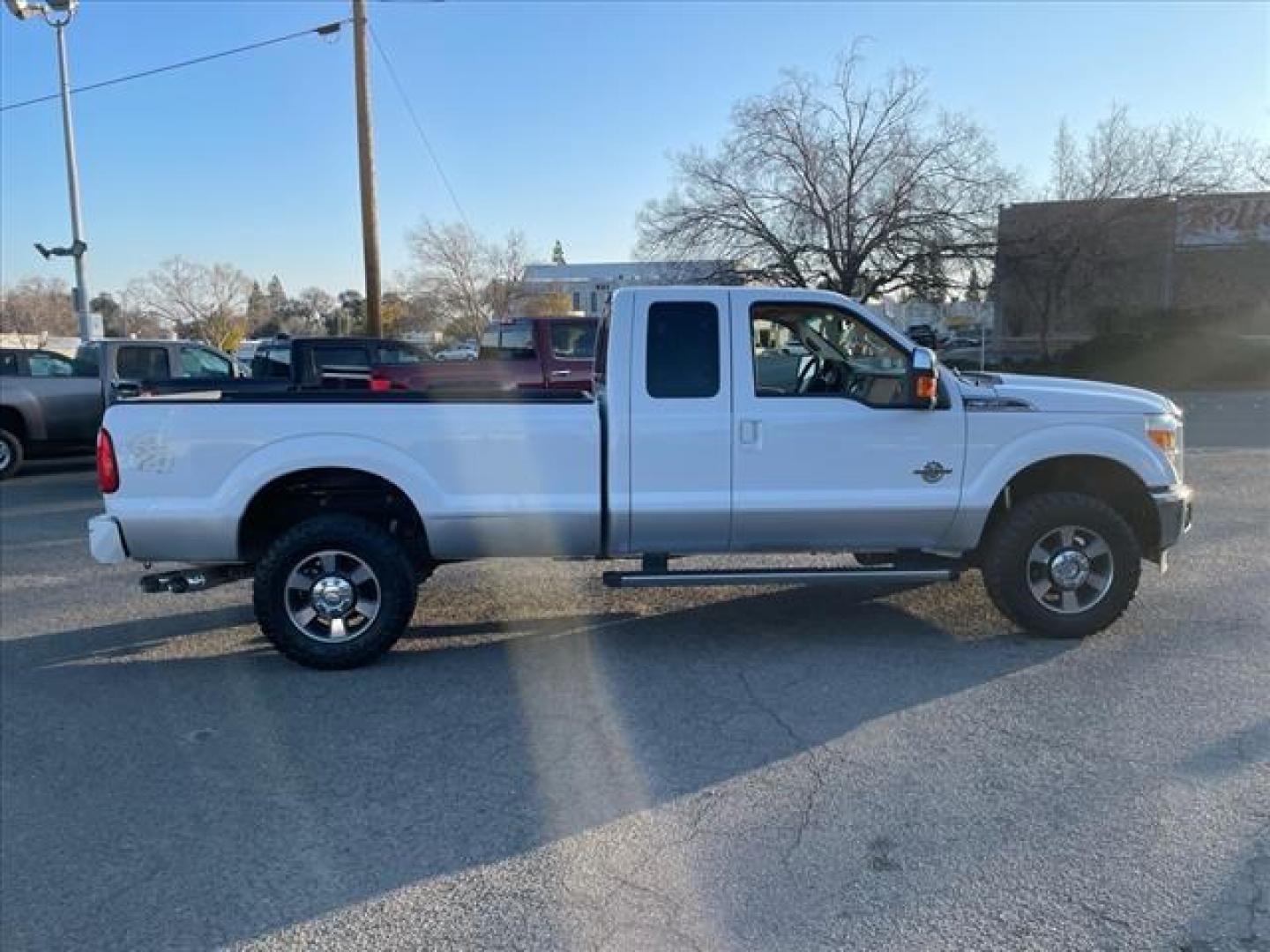 2011 Oxford White/Sterling Grey Ford F-350 Super Duty Lariat (1FT8X3BT9BE) with an 6.7L Power Stroke 6.7L Biodiesel Turbo V8 400hp 800ft. lbs. Common Rail Direct Injection engine, 6-Speed Shiftable Automatic transmission, located at 800 Riverside Ave, Roseville, CA, 95678, (916) 773-4549, 38.732265, -121.291039 - DIESEL SUPER CAB 4X4 LARIAT ONE OWNER SERVICE RECORDS ON CLEAN CARFAX - Photo#5