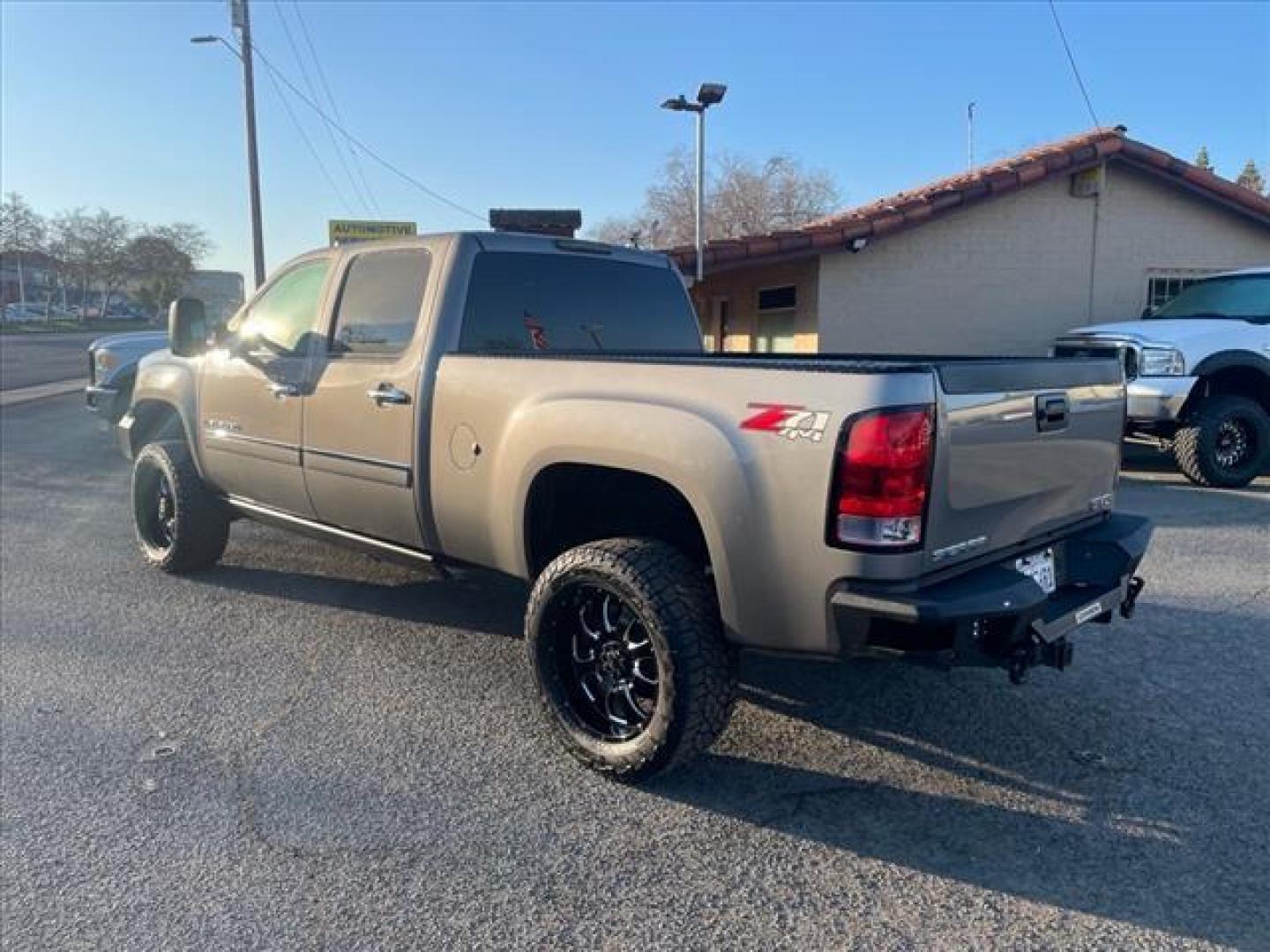 2014 Steel Gray Metallic GMC Sierra 2500HD Denali (1GT125E88EF) with an 6.6L Duramax 6.6L Diesel Turbo V8 397hp 765ft. lbs. Common Rail Direct Injection engine, Allison 1000 6-Speed Shiftable Automatic transmission, located at 800 Riverside Ave, Roseville, CA, 95678, (916) 773-4549, 38.732265, -121.291039 - Photo#4