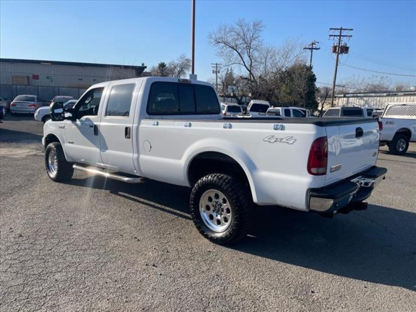 2006 Oxford White Clearcoat Ford F-350 Super Duty XLT (1FTWW31P26E) with an 6.0L Power Stroke 6.0L Diesel Turbo V8 325hp 560ft. lbs. Direct Injection engine, 5-Speed Automatic transmission, located at 800 Riverside Ave, Roseville, CA, 95678, (916) 773-4549, 38.732265, -121.291039 - DIESEL CREW CAB 4X4 XLT - Photo#2